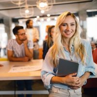 Happy employee in modern workplace