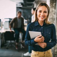 Happy employee in modern workplace